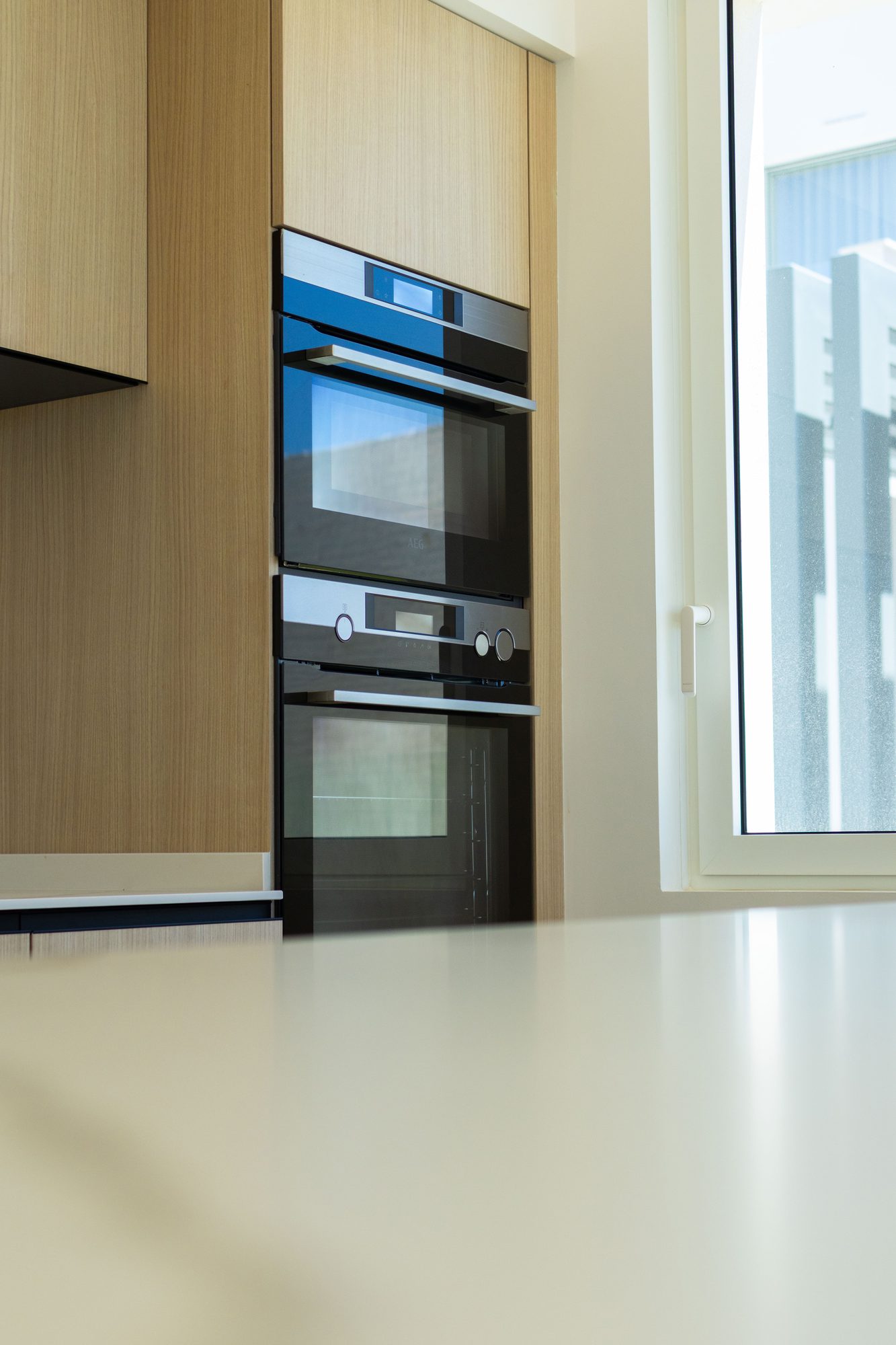 Built-in ovens in a wood kitchen
