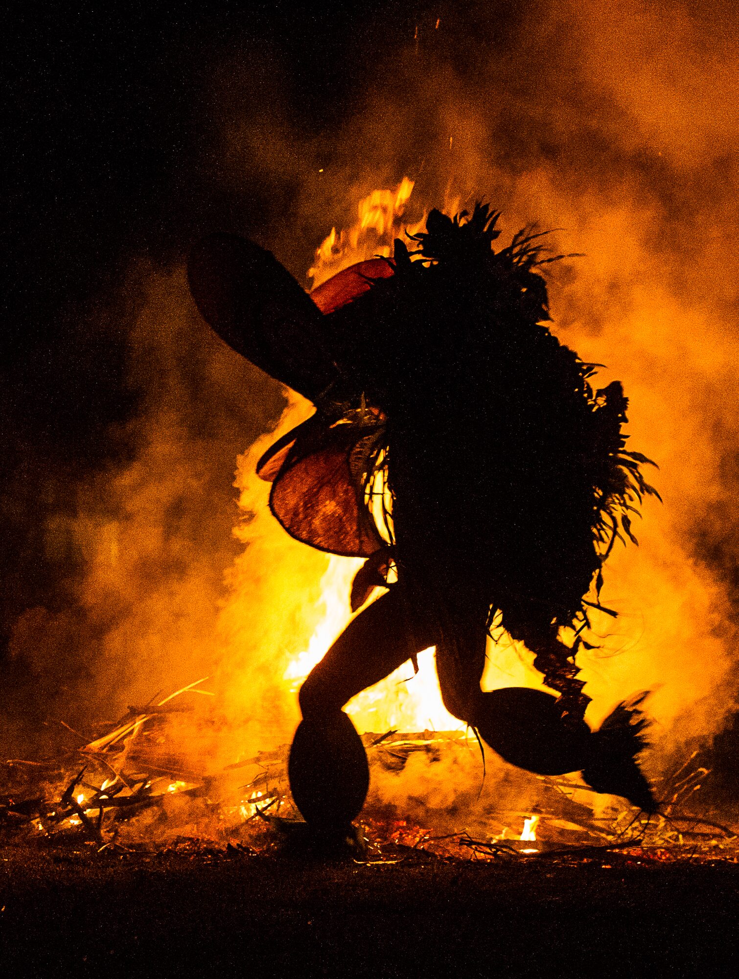 Baining fire dancer silhouette