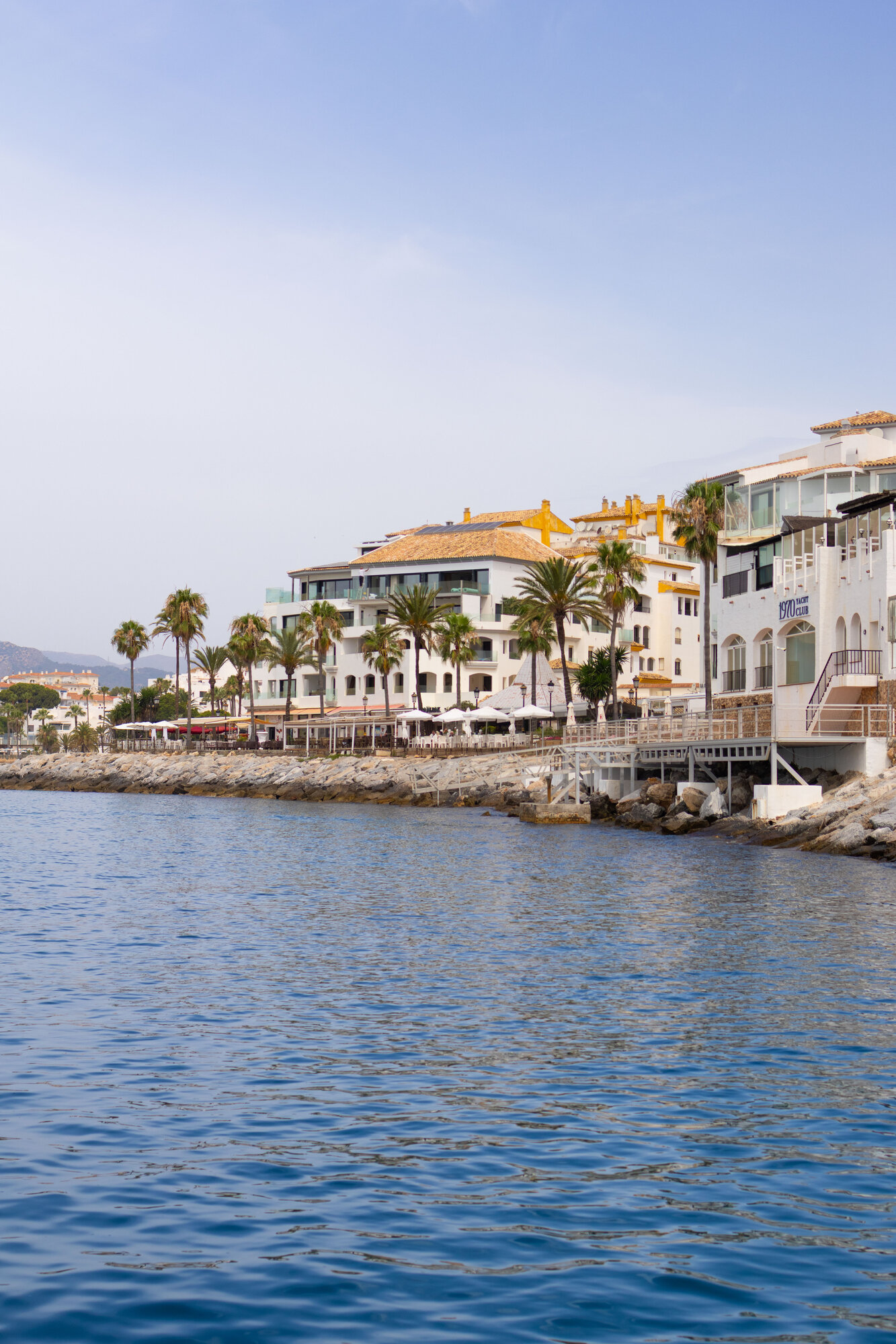 White coastal town seen from the water